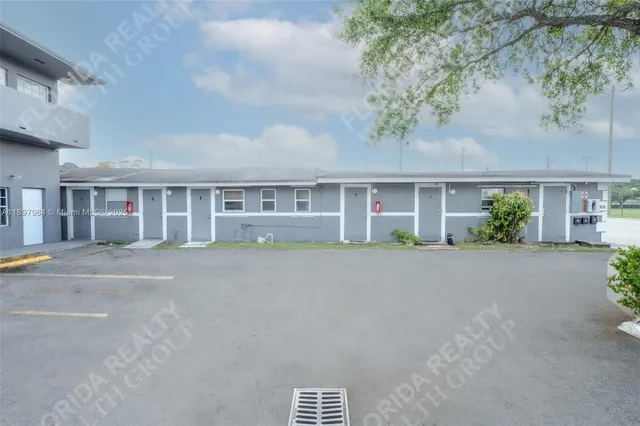 front view of a house with a garden