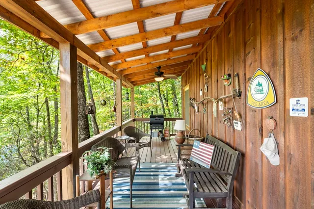 a view of a chairs and table in the patio