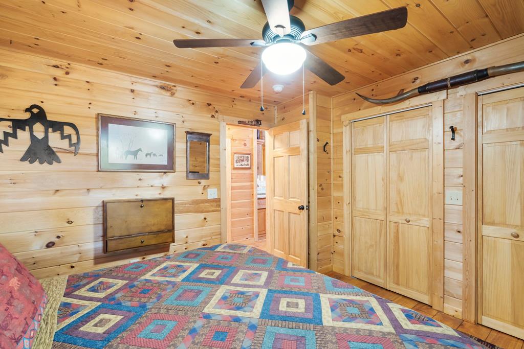 205 Copper Mountain Drive Murphy, NC 28906 - Photo 27 of 29 a bedroom with a bed and a view of bathroom