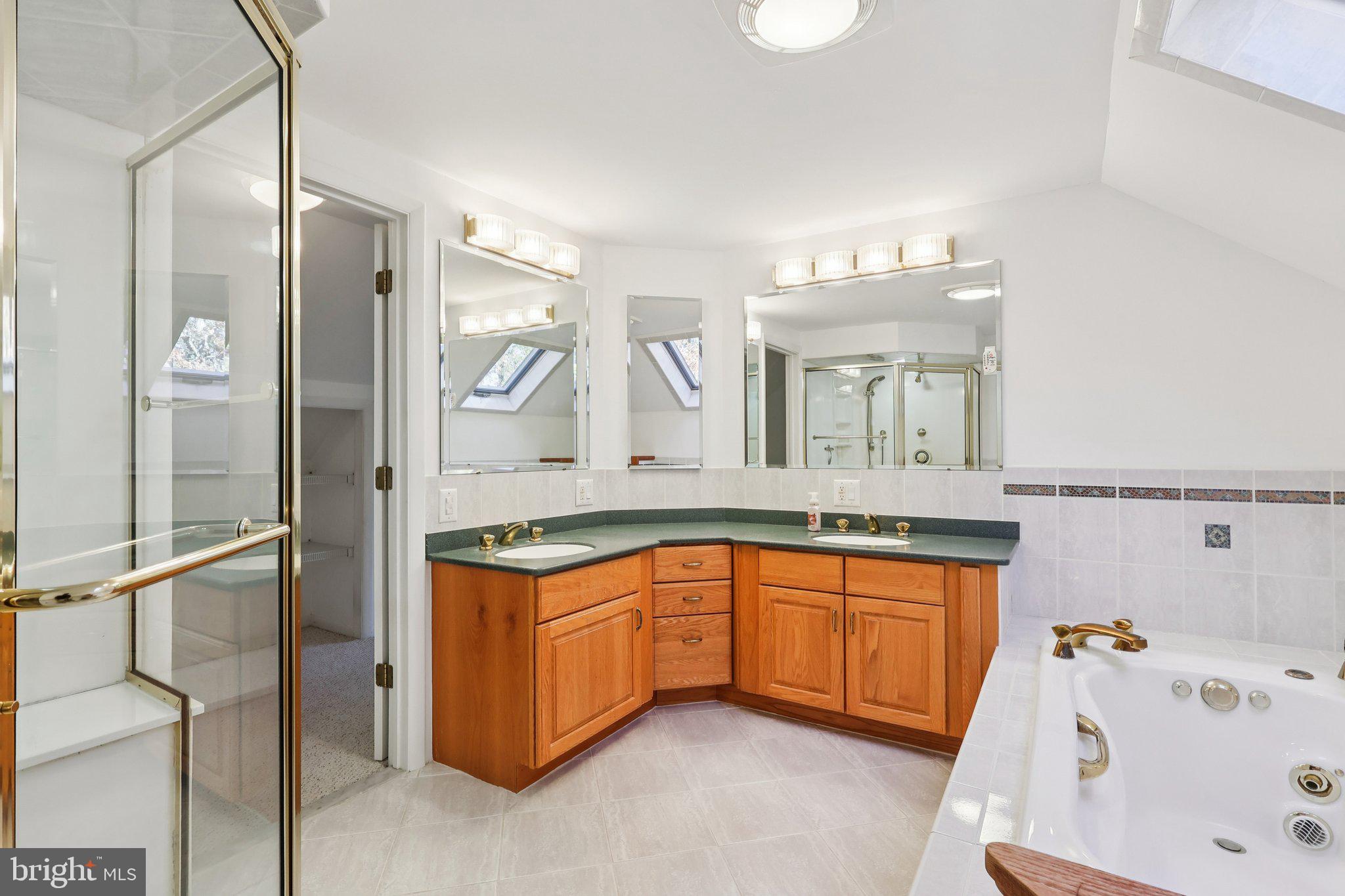 7 Pontiac Drive Medford, NJ 08055 - Photo 32 of 49 a bathroom with a granite countertop sink and a mirror