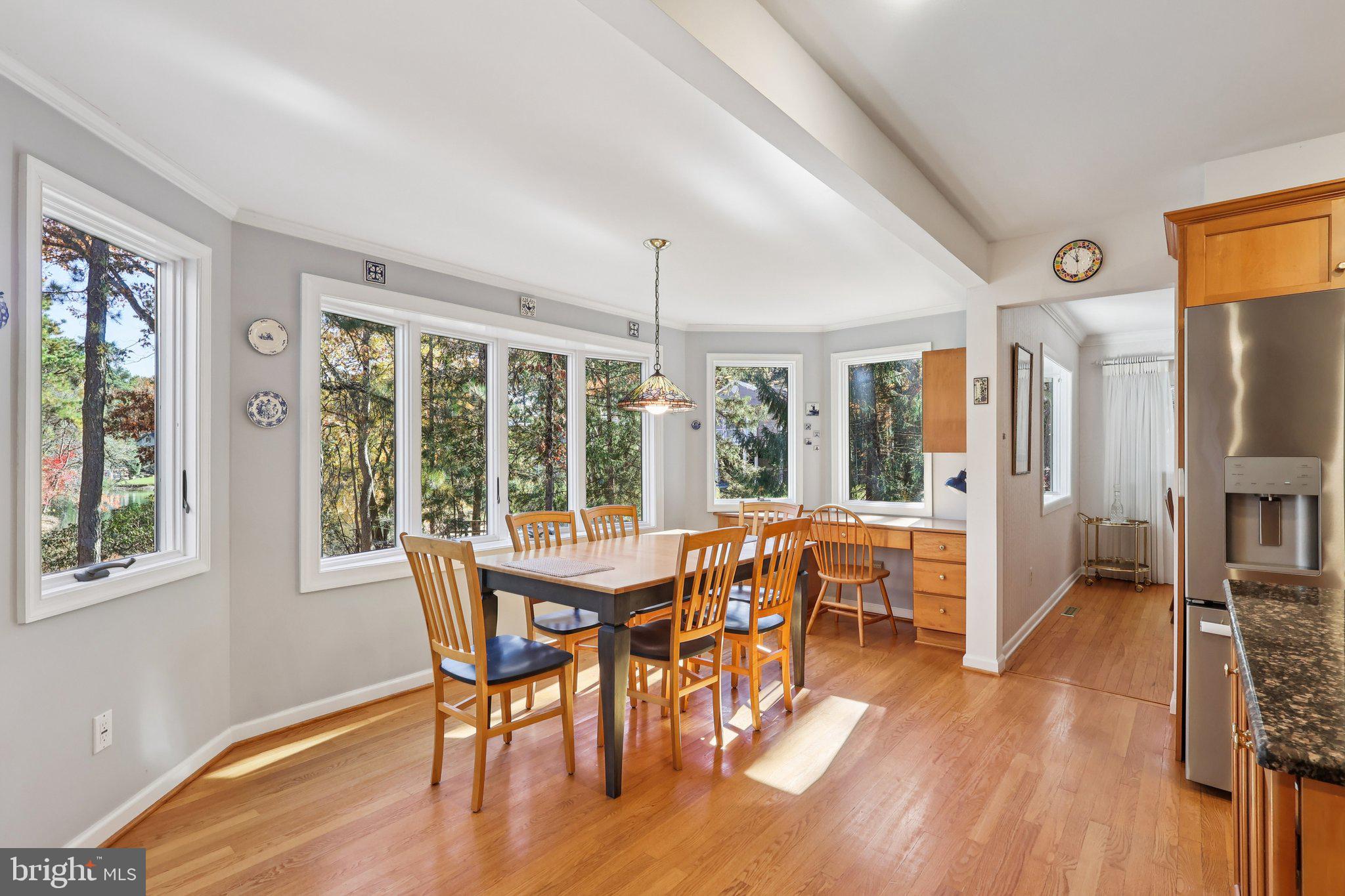 7 Pontiac Drive Medford, NJ 08055 - Photo 5 of 49 a view of a dining room with furniture window and wooden floor