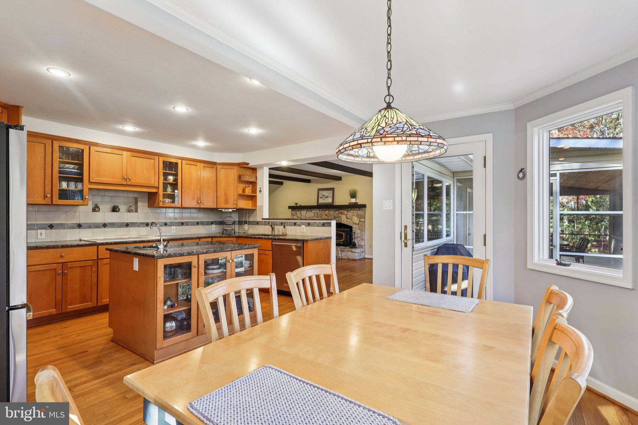 7 Pontiac Drive Medford, NJ 08055 - Photo 7 of 49 a kitchen with stainless steel appliances granite countertop a stove and a wooden floors