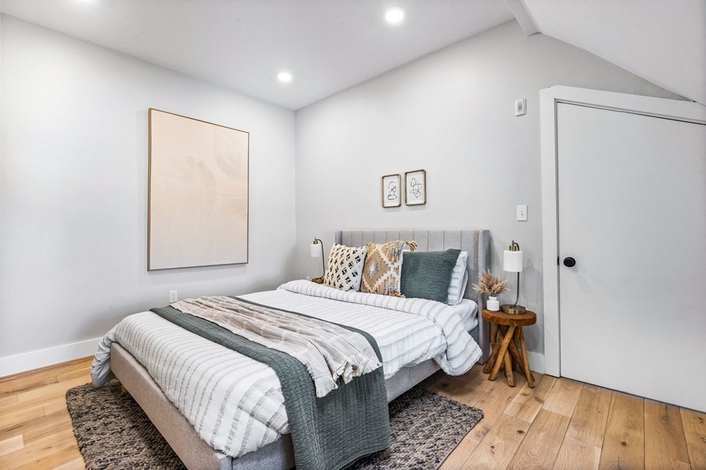 14 Hillside Park, Unit 6 Somerville, MA 02143 - Photo 26 of 32 a bedroom with bed and a window