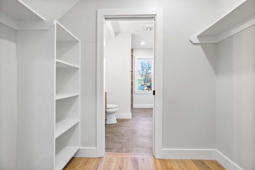 14 Hillside Park, Unit 6 Somerville, MA 02143 - Photo 27 of 32 a view of a bathroom from a hallway