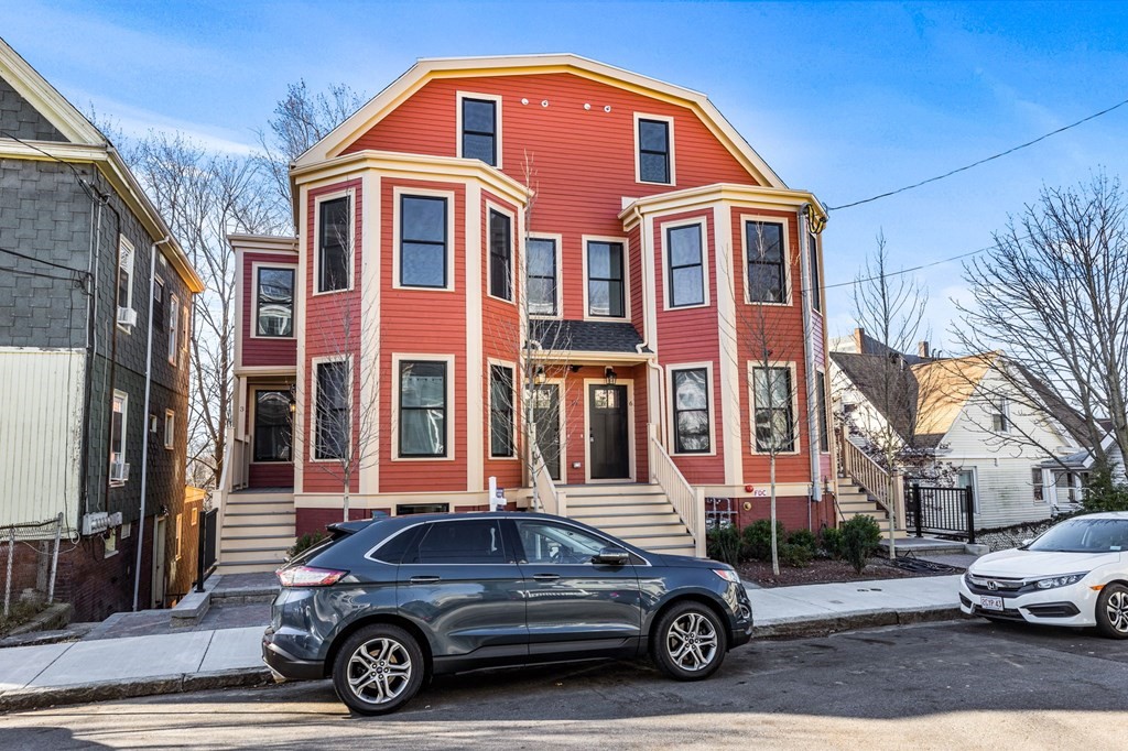 14 Hillside Park, Unit 6 Somerville, MA 02143 - Photo 32 of 32 a car parked in front of a house