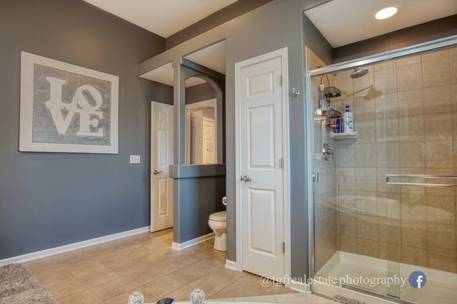 S643 Robbins Street Winfield, IL 60190 - Photo 17 of 40 a view of a bathroom with a shower