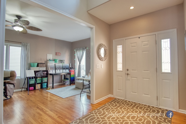 S643 Robbins Street Winfield, IL 60190 - Photo 3 of 40 a living room with furniture and a wooden floor