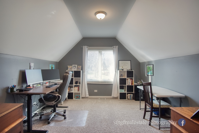 S643 Robbins Street Winfield, IL 60190 - Photo 21 of 40 a view of a workspace with furniture and a window
