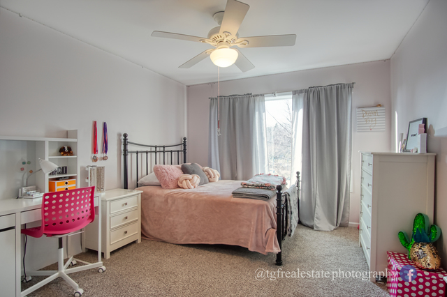 S643 Robbins Street Winfield, IL 60190 - Photo 24 of 40 a bedroom with furniture and a window