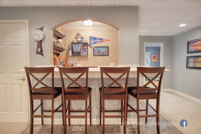 S643 Robbins Street Winfield, IL 60190 - Photo 29 of 40 a view of a dining room that has a table and chairs in it