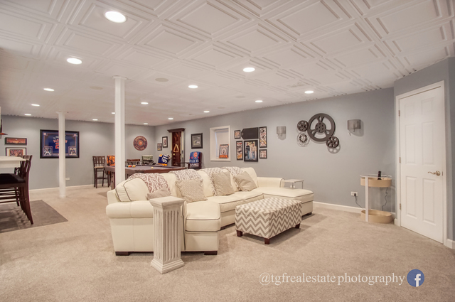 S643 Robbins Street Winfield, IL 60190 - Photo 31 of 40 a living room with furniture and a glass table
