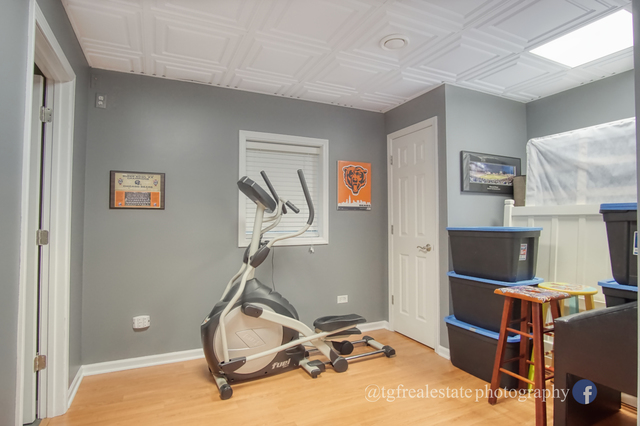 S643 Robbins Street Winfield, IL 60190 - Photo 35 of 40 a room with gym equipment