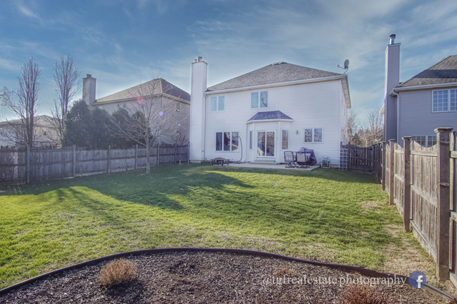 S643 Robbins Street Winfield, IL 60190 - Photo 40 of 40 a view of a house with a yard