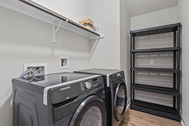 a utility room with dryer and washer