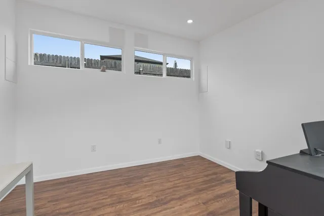 a view of kitchen with wooden floor