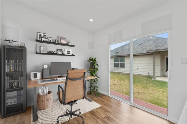 a kitchen with stainless steel appliances a refrigerator sink and microwave