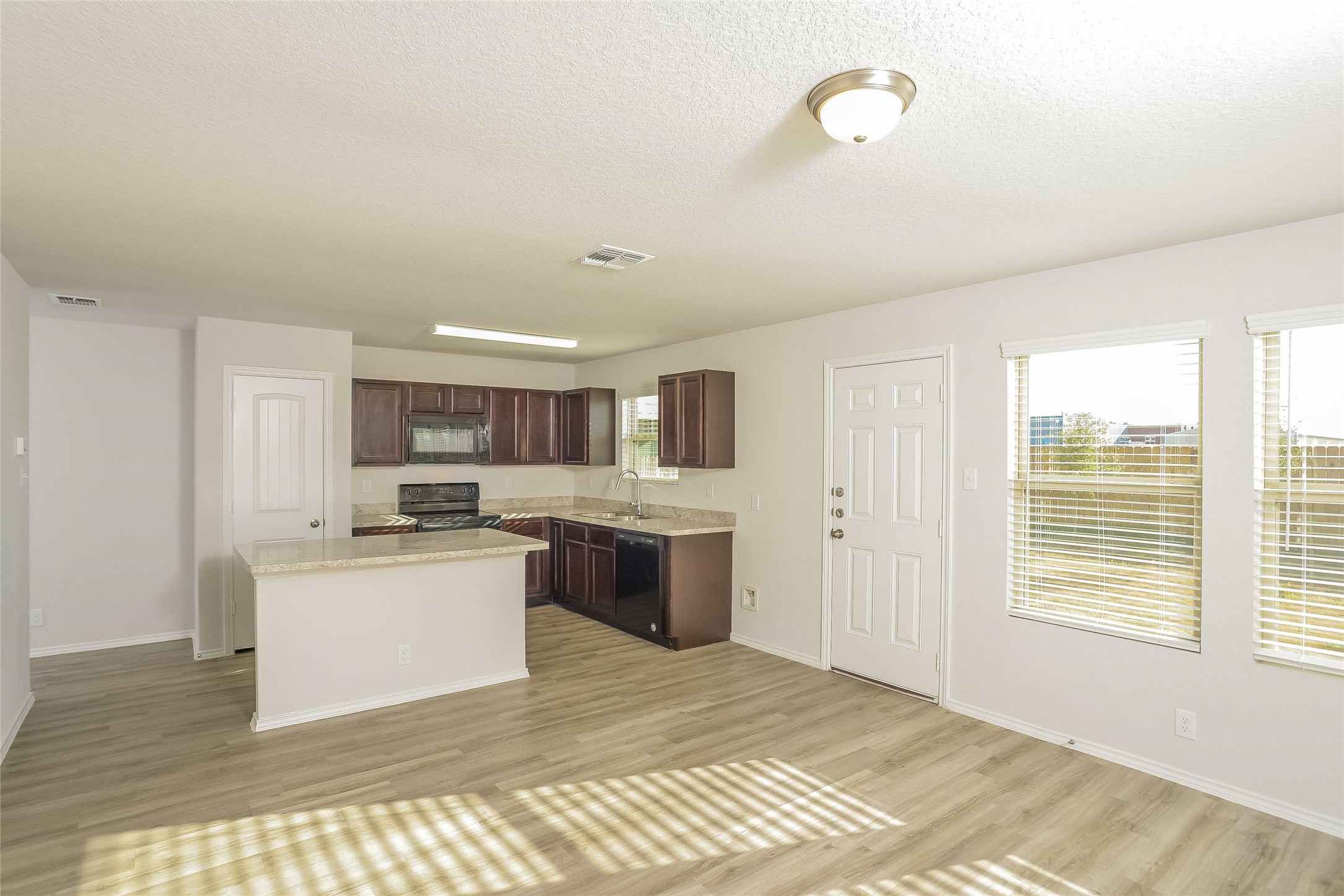 5030 Banyan Tree Trail Spring, TX 77373 - Photo 5 of 18 a kitchen with a sink appliances and cabinets