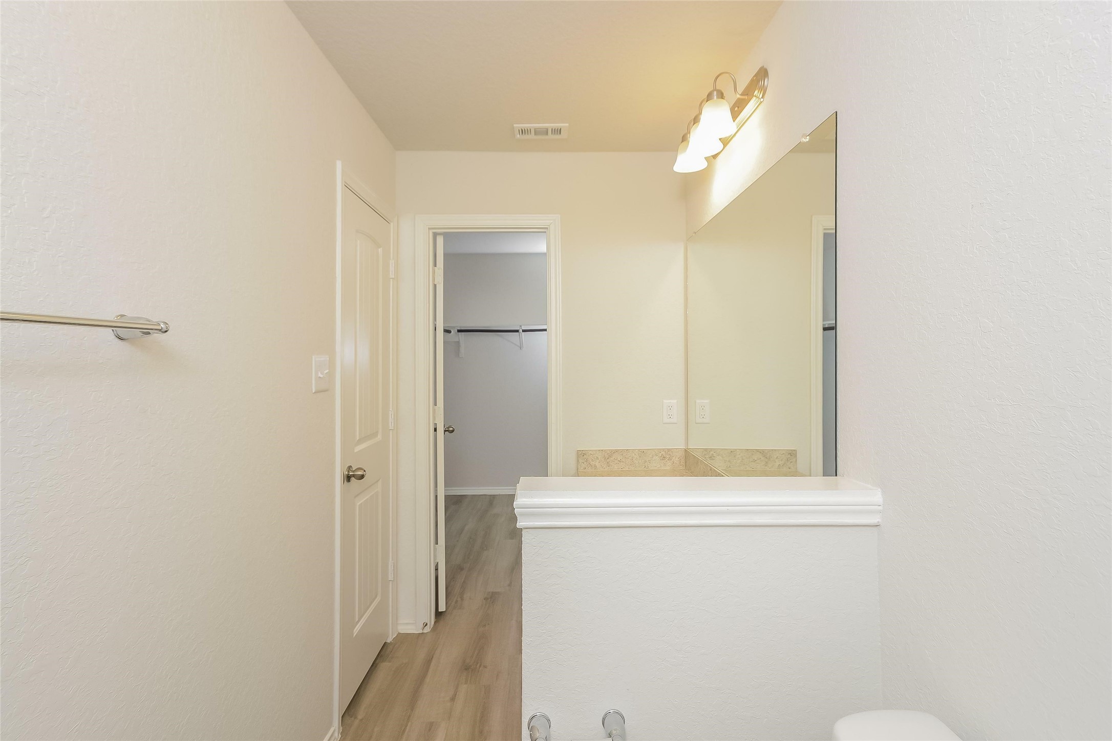 5030 Banyan Tree Trail Spring, TX 77373 - Photo 8 of 18 a bathroom with a sink a mirror and a toilet