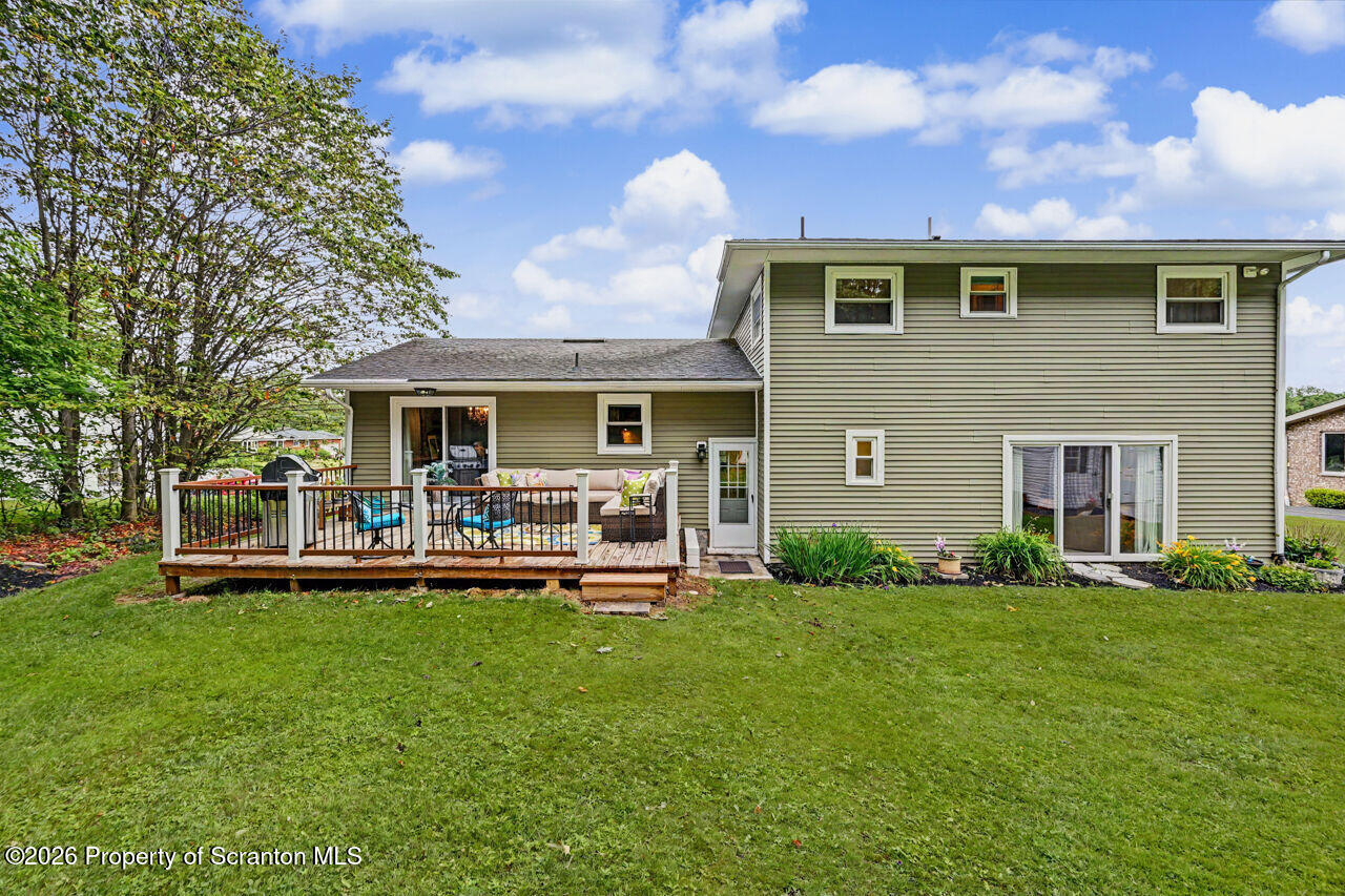 121 T Rt 351 Moscow, PA 18444 - Photo 64 of 79 a front view of house with yard and outdoor seating
