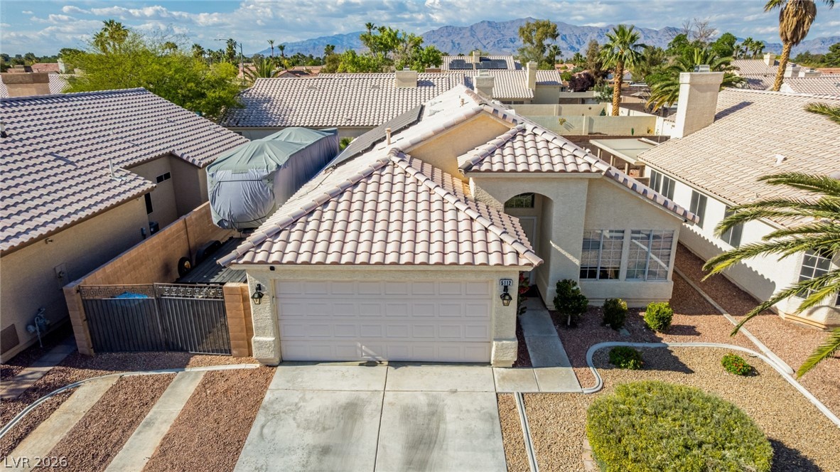 5112 West Camino Del Rancho Las Vegas, NV 89130 - Photo 40 of 44 This charming home offers classic architectural details, a practical layout, and a welcoming presence.