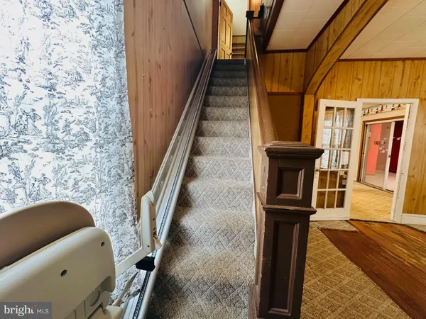 a stair with table and chairs