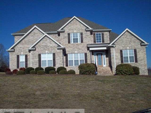7800 Irene Lane Oak Ridge, NC 27310 - Photo 1 of 16 Exterior Front.