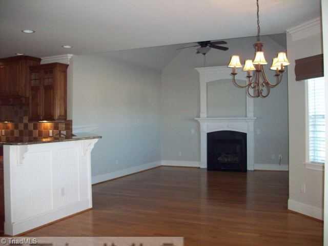 7800 Irene Lane Oak Ridge, NC 27310 - Photo 7 of 16 Other. kitchen - breakfast area - fireplace