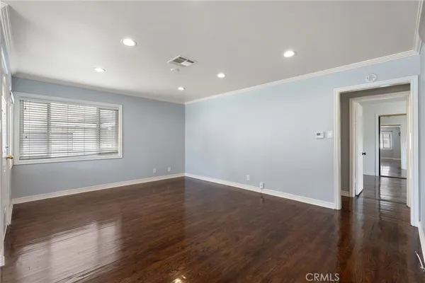a kitchen with a sink and a refrigerator