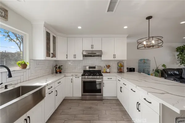 a house view with a backyard space