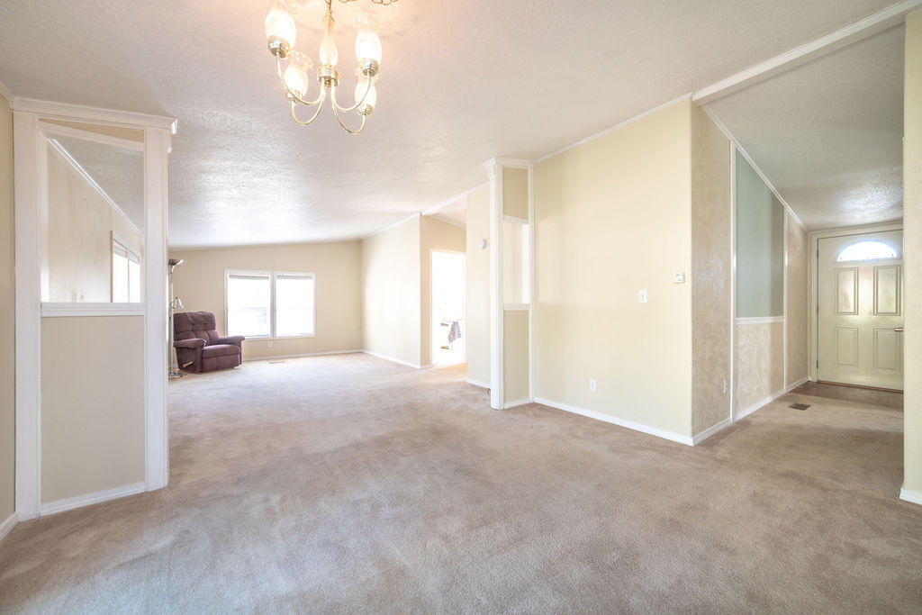 19132 Pumice Butte Road Bend, OR 97702 - Photo 7 of 49 a view of livingroom with window