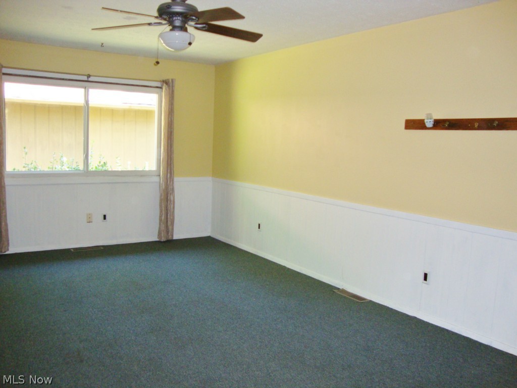 5698 Rock Point Circle North Ridgeville, OH 44039 - Photo 11 of 25 The spacious bonus room is carpeted and could easily be an office, playroom or game room. Located with access to the garage.