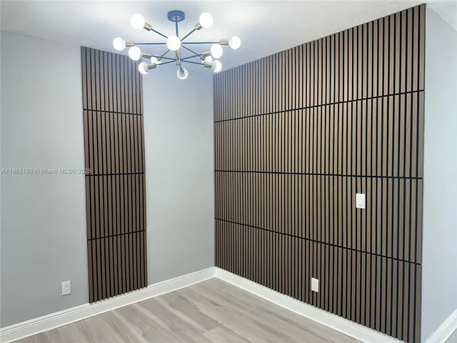 a view of a livingroom with a ceiling fan