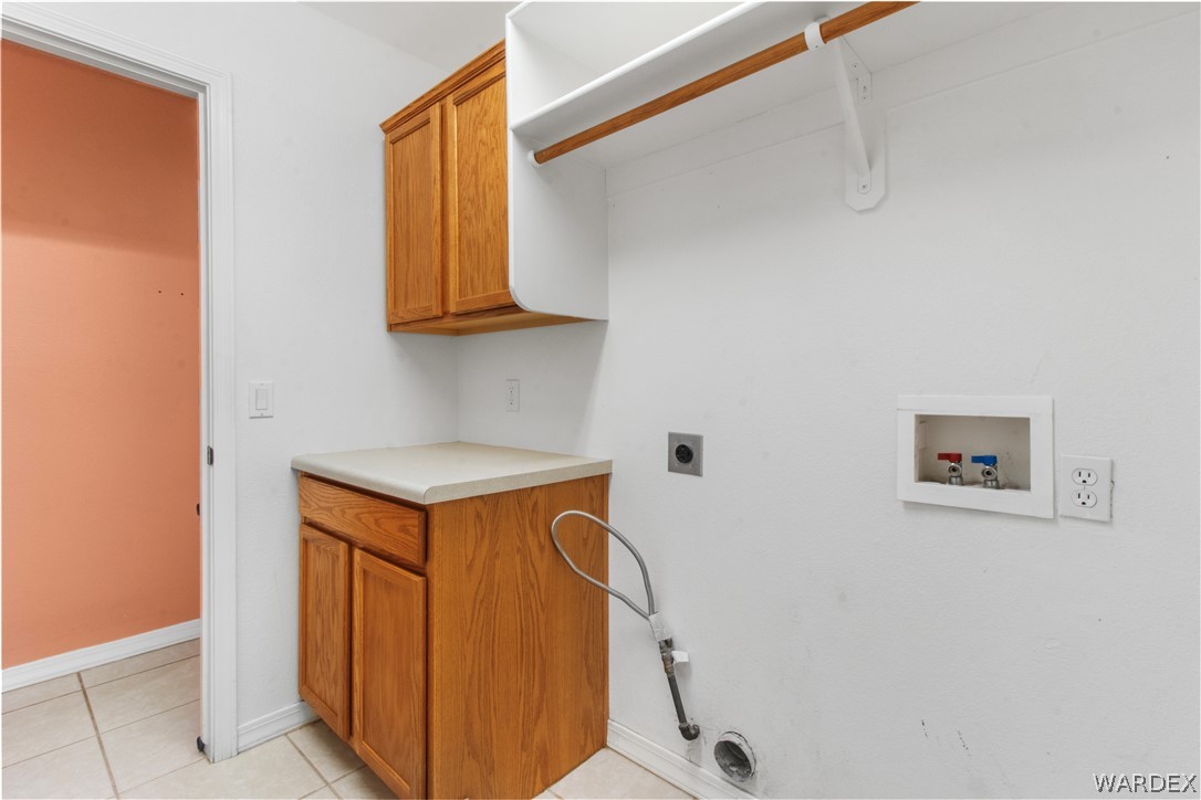2158 Ranch Road Kingman, AZ 86401 - Photo 32 of 48 a utility room with a sink a washer and dryer