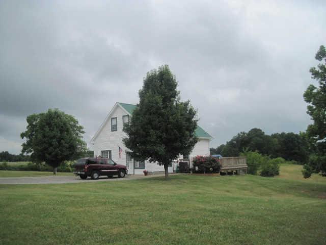 6526 Beckwith Road Mount Juliet, TN 37122 - Photo 2 of 13 a view of a trees and barn in the back yard