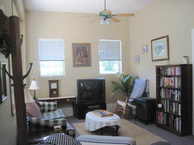 6526 Beckwith Road Mount Juliet, TN 37122 - Photo 11 of 13 a living room with furniture fireplace and a window