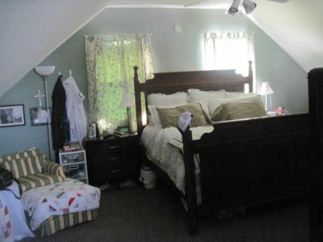 6526 Beckwith Road Mount Juliet, TN 37122 - Photo 12 of 13 a bed room with a bed window and a mirror