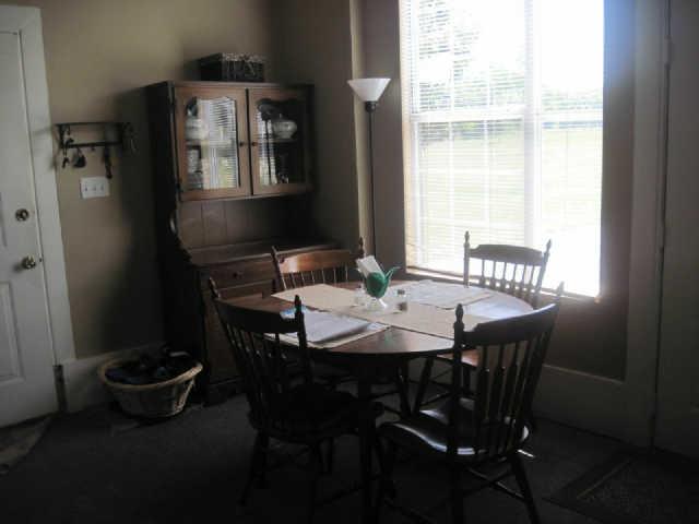 6526 Beckwith Road Mount Juliet, TN 37122 - Photo 9 of 13 a view of a dining room with furniture and window