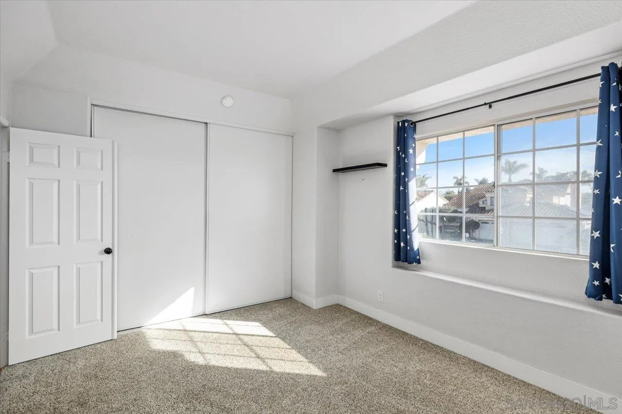 331 Vista Marazul Oceanside, CA 92057 - Photo 14 of 27 a view of an empty room with a window