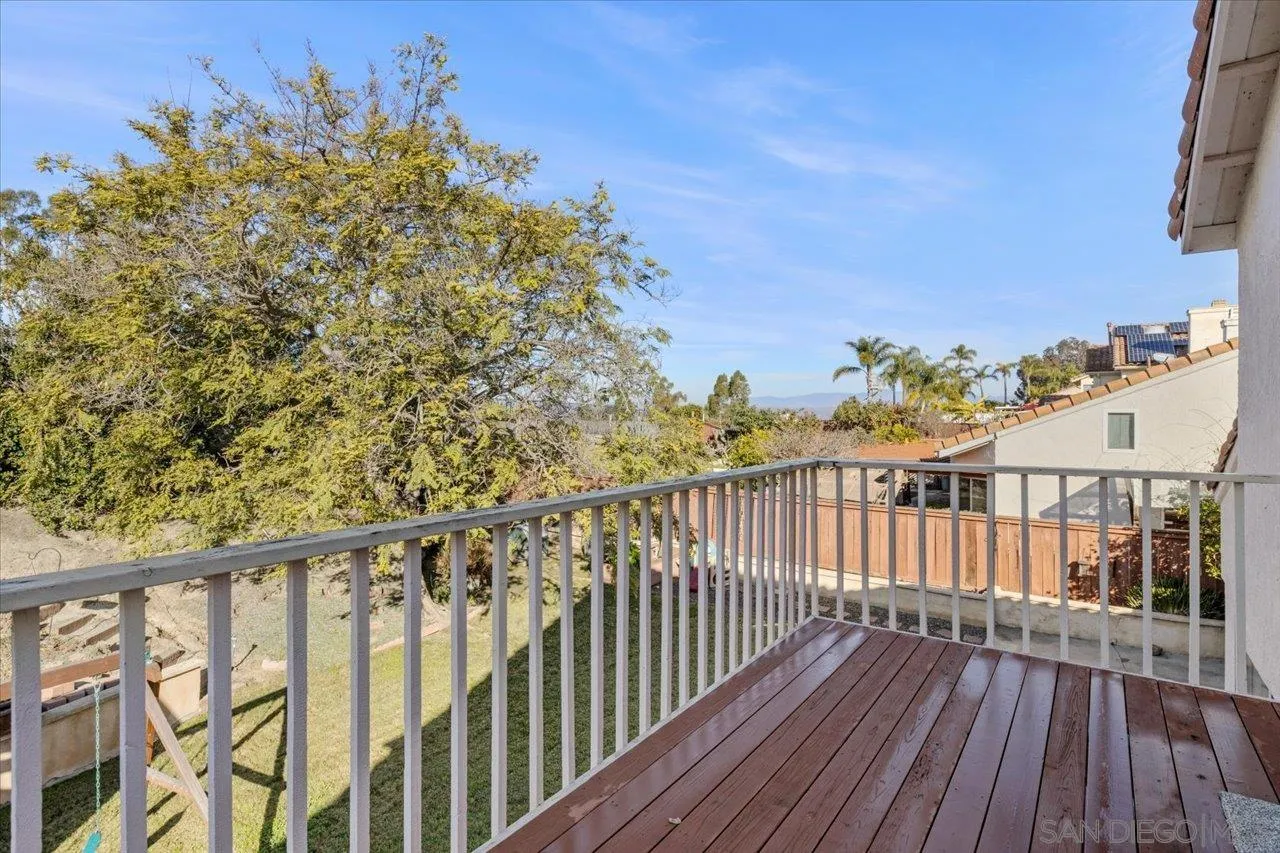 331 Vista Marazul Oceanside, CA 92057 - Photo 21 of 27 a view of a balcony with wooden floor and fence