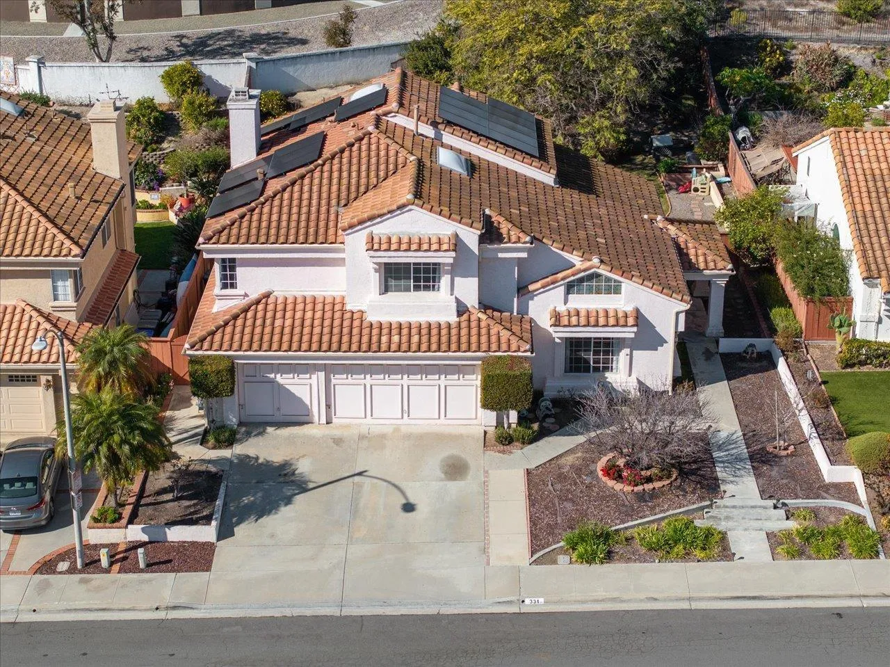 331 Vista Marazul Oceanside, CA 92057 - Photo 25 of 27 front view of a house with a street