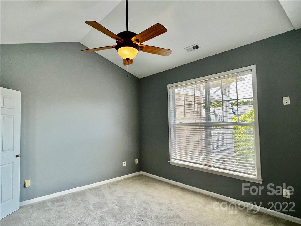18742 Nautical Drive, Unit 305 Cornelius, NC 28031 - Photo 14 of 30 a view of a room with a window and ceiling fan