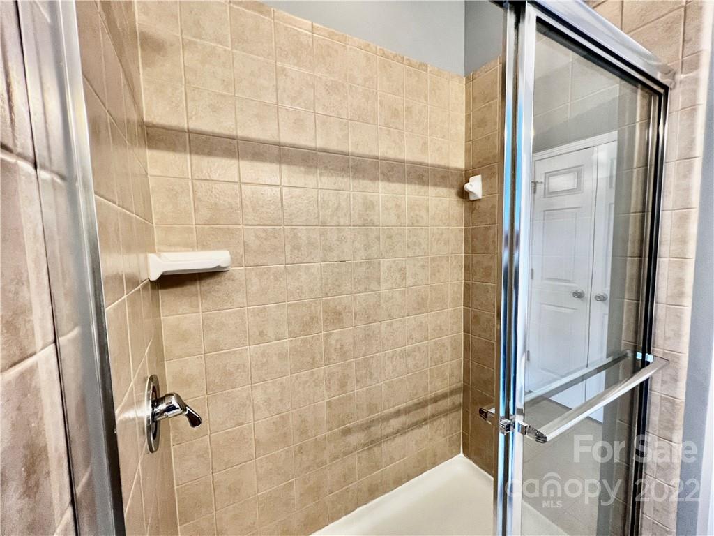 18742 Nautical Drive, Unit 305 Cornelius, NC 28031 - Photo 16 of 30 a bathroom with a shower