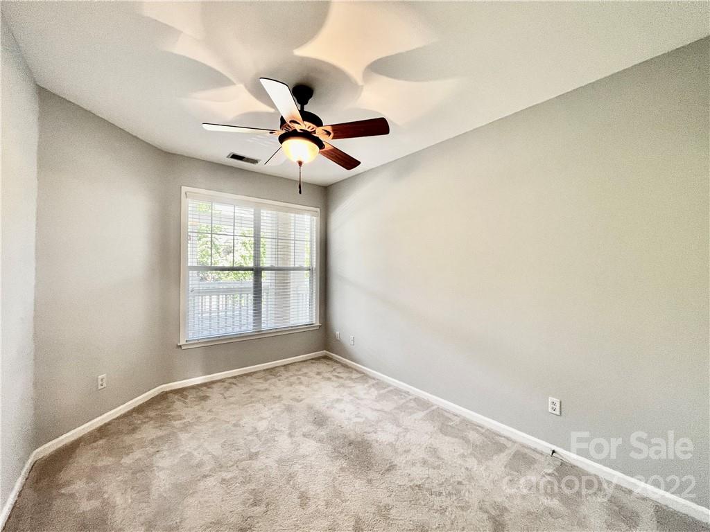 18742 Nautical Drive, Unit 305 Cornelius, NC 28031 - Photo 17 of 30 a view of room with a ceiling fan