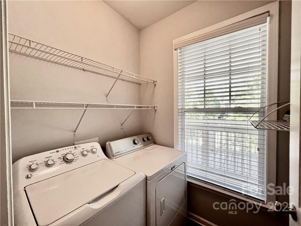 18742 Nautical Drive, Unit 305 Cornelius, NC 28031 - Photo 19 of 30 a utility room with dryer and washer