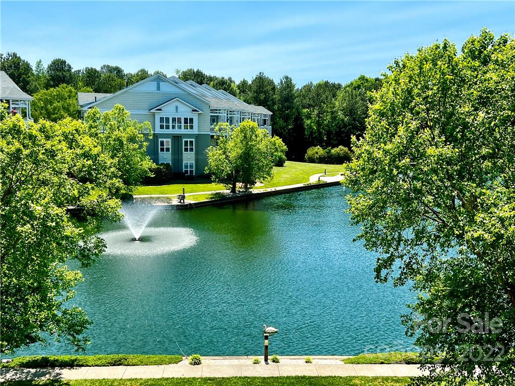 18742 Nautical Drive, Unit 305 Cornelius, NC 28031 - Photo 2 of 30 a view of a house with a yard