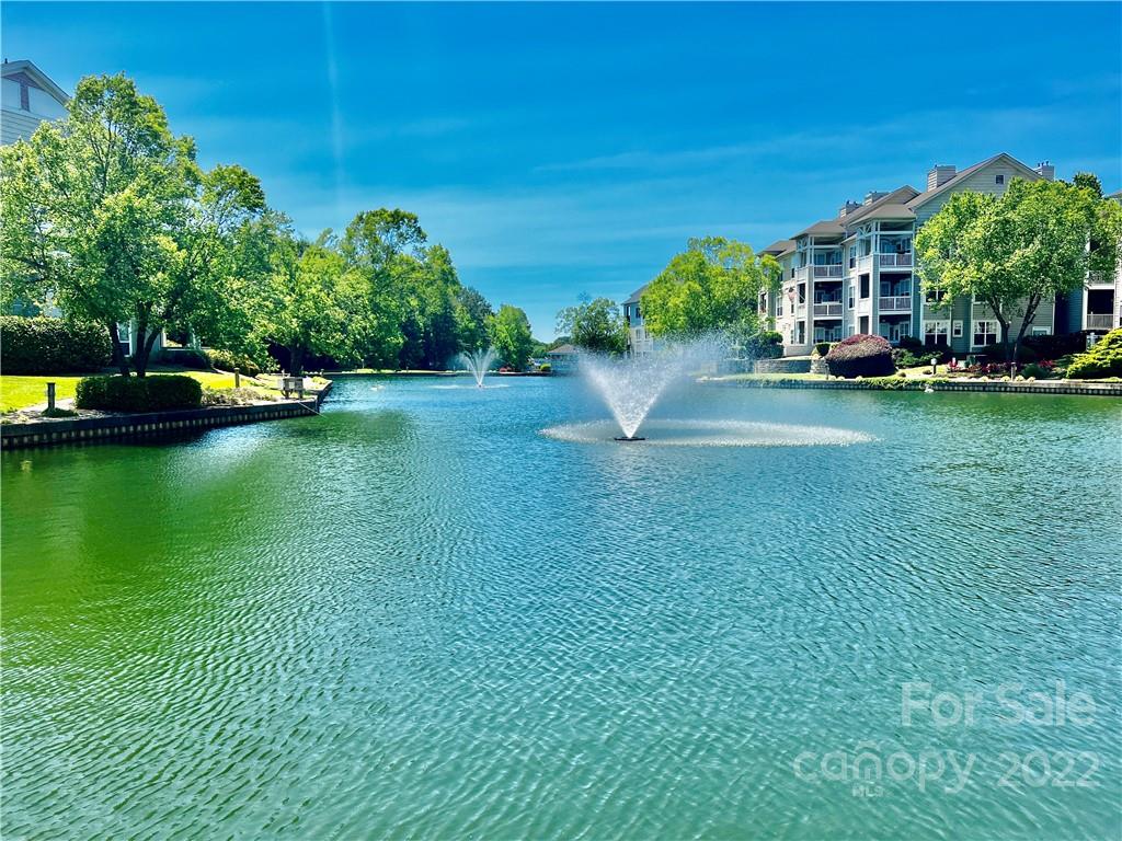 18742 Nautical Drive, Unit 305 Cornelius, NC 28031 - Photo 22 of 30 a front view of a house with garden