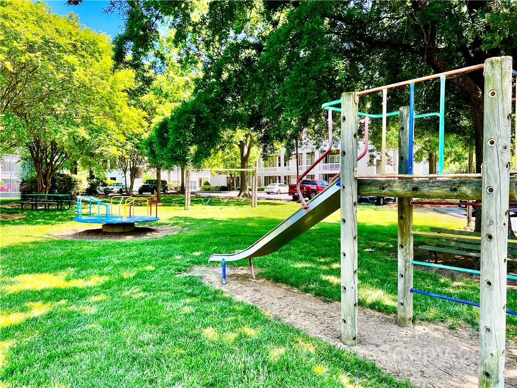 18742 Nautical Drive, Unit 305 Cornelius, NC 28031 - Photo 29 of 30 a garden view with a sitting space