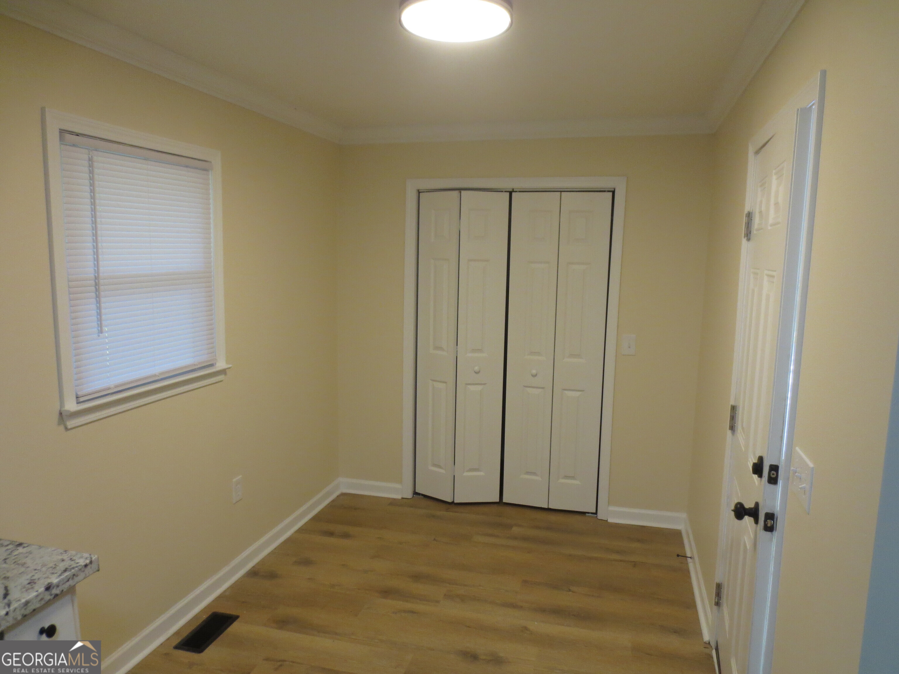 141 Wall Street Warner Robins, GA 31088 - Photo 4 of 16 a view of an empty room