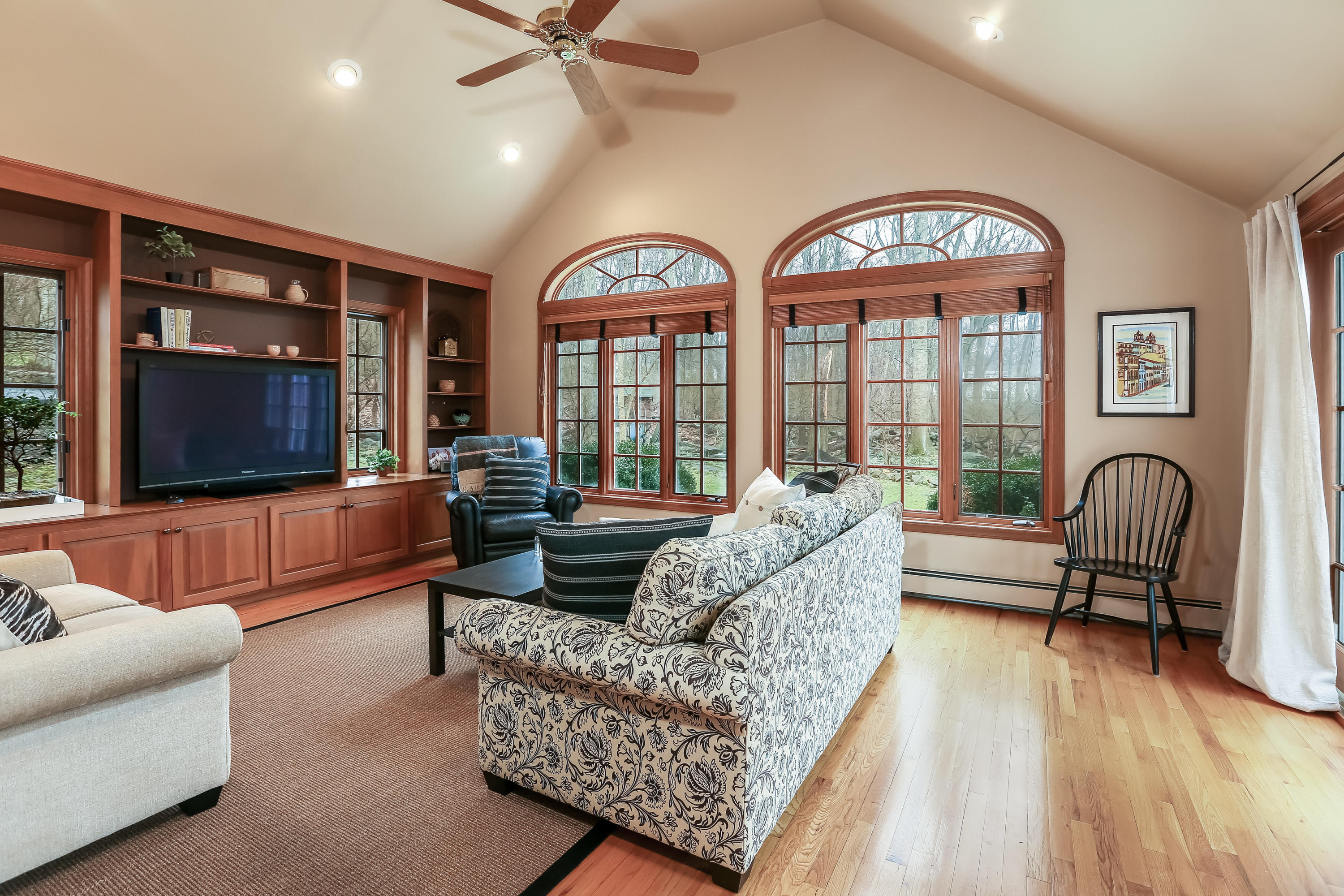 7 Briar Brae Road Darien, CT 06820 - Photo 16 of 35 a living room with furniture and a flat screen tv