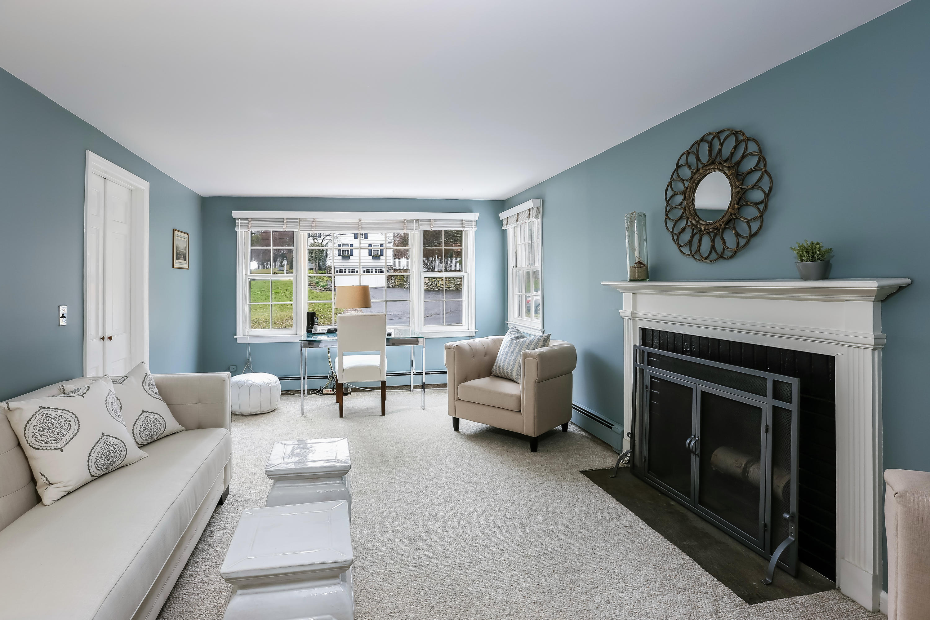 7 Briar Brae Road Darien, CT 06820 - Photo 18 of 35 a living room with furniture and a fireplace